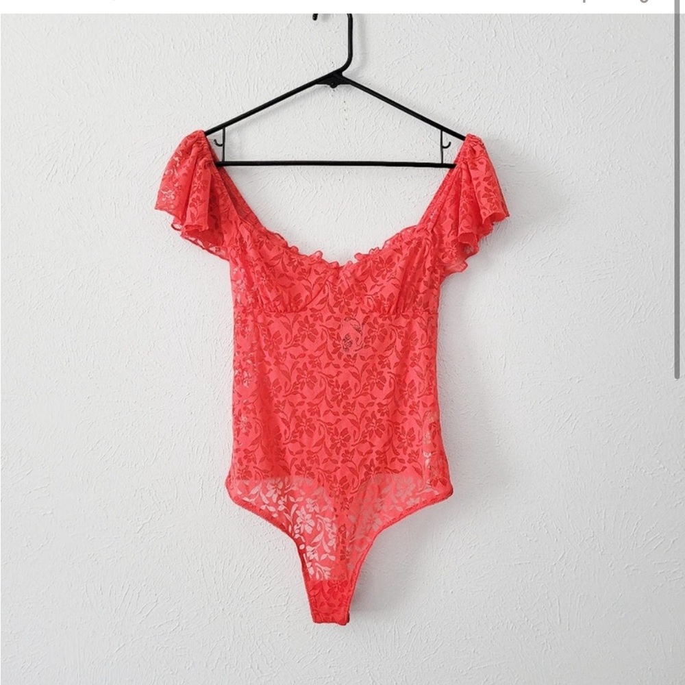 Free People Lace Bodysuit in red